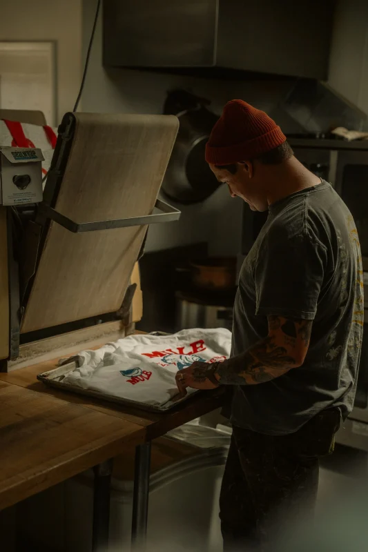 Heat press production for a custom T-shirt